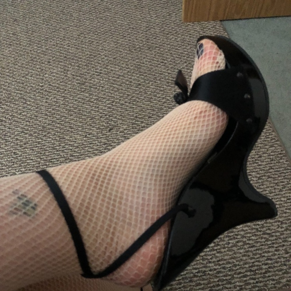 Black Gianfranco Ferre wedges .